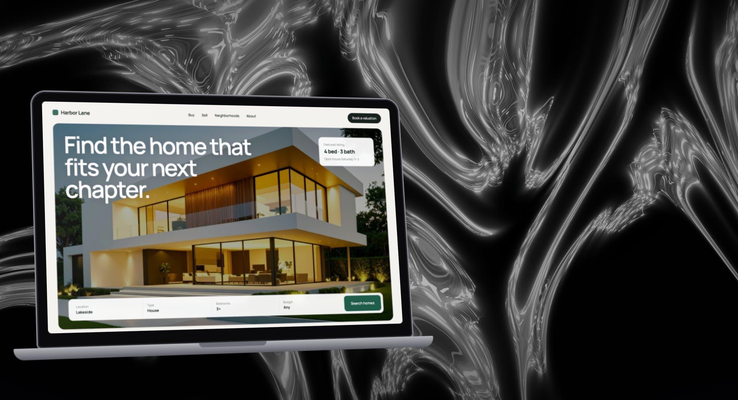 A concept real-estate website on a laptop, set against liquid chrome